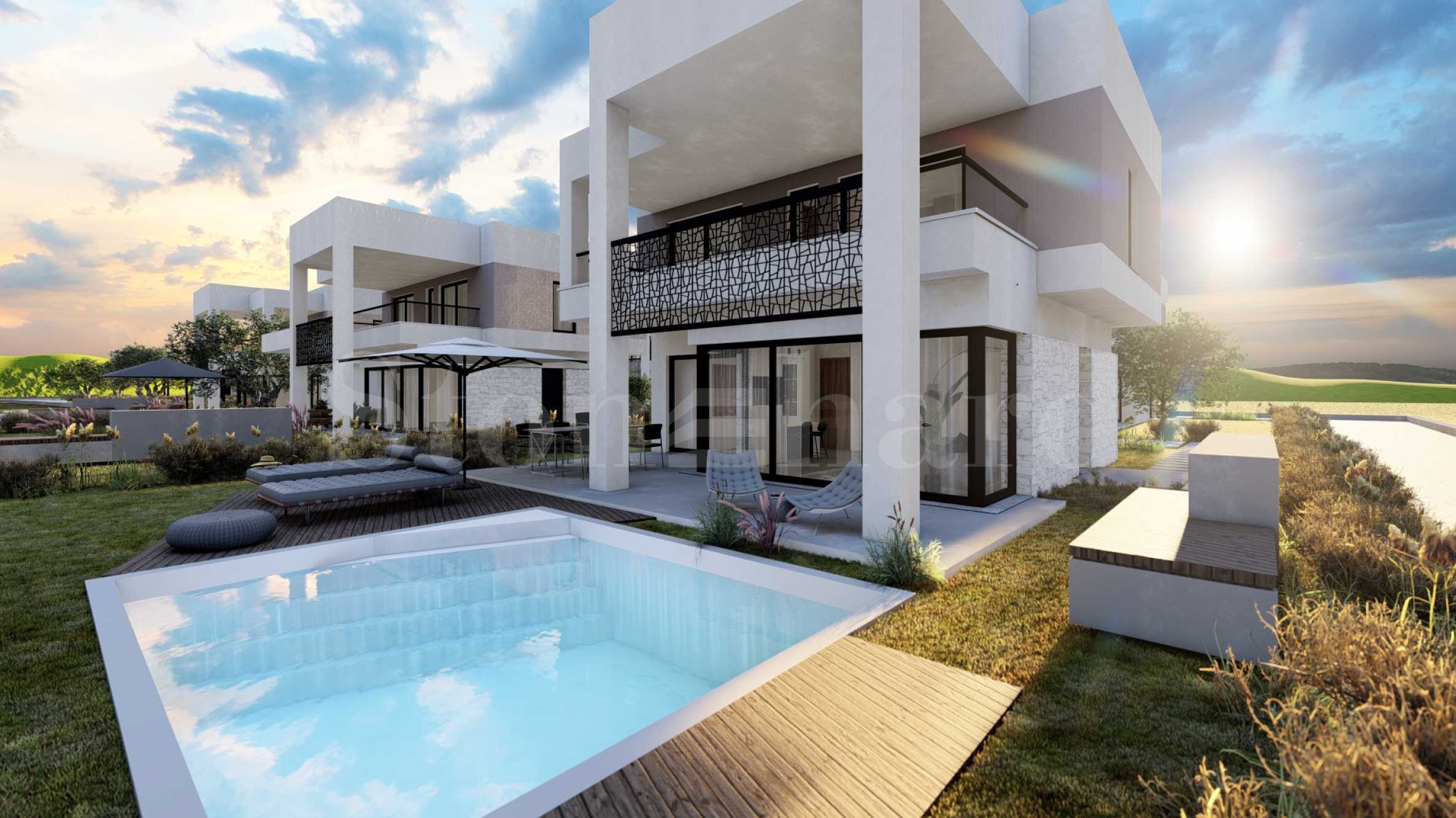 Two and three bedroom villas in a new complex 50 m from the beach in Nea Kerdilia 1 - Stonehard