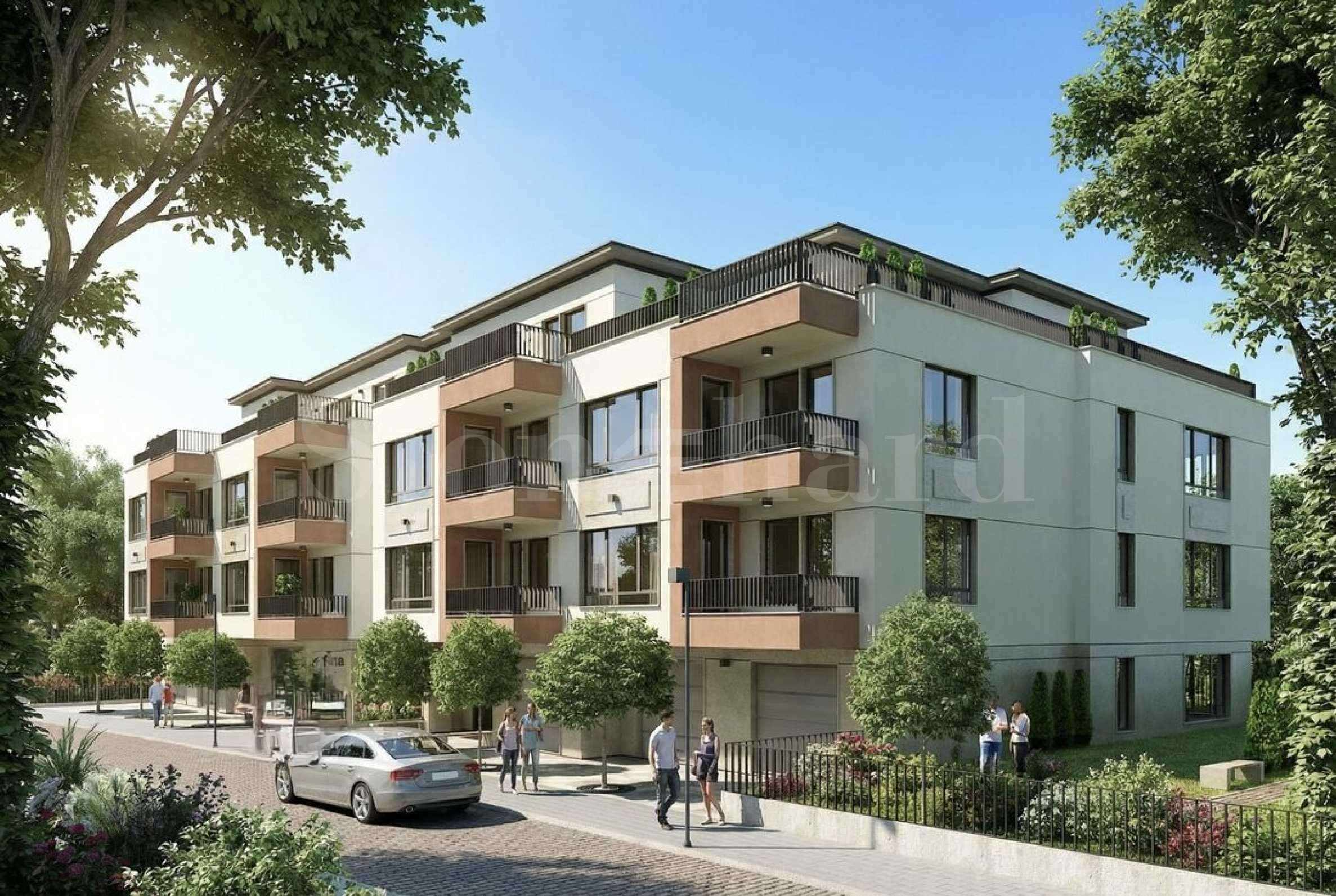 Multi-family residential building with a landscaped yard and various types of apartments in the 